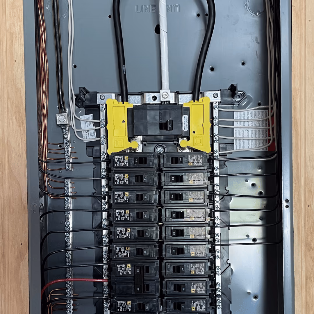 Breaker panel with a whole-home surge protector installed at the top