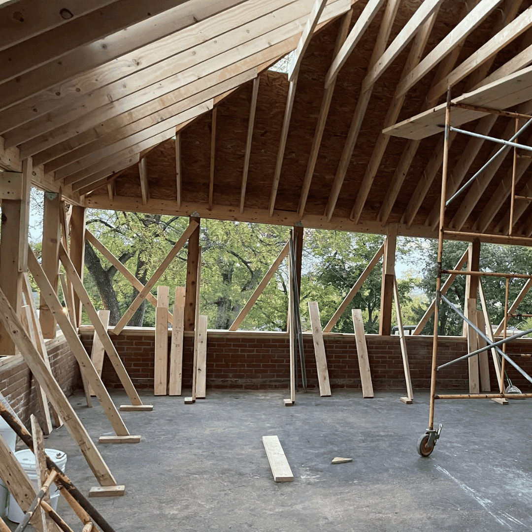 Wood roof framing during a home construction project