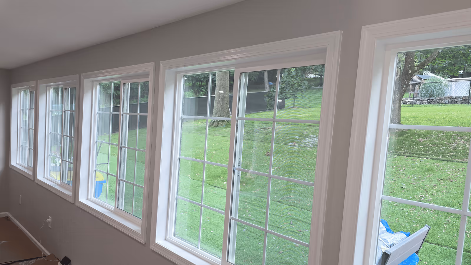 Row of newly installed windows in a bright room