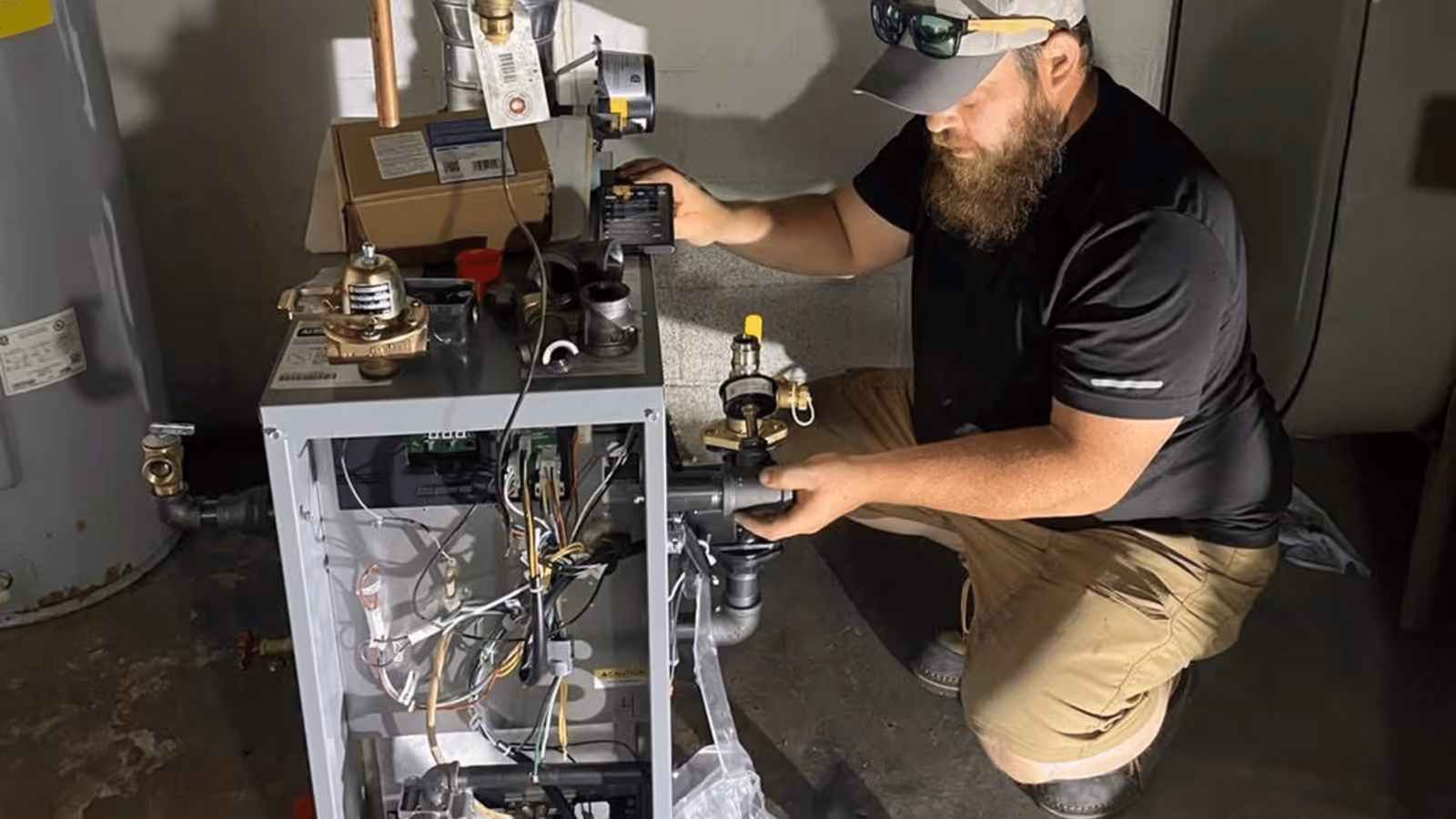 Yorktowne technician working on a furnace installation